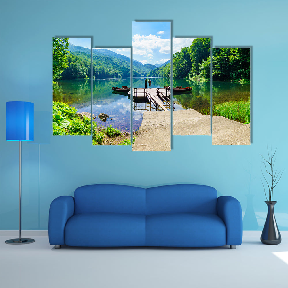 Fisherman on a pier in Lake Biograd Biogradsko jezero, Montenegro multi panel canvas wall art