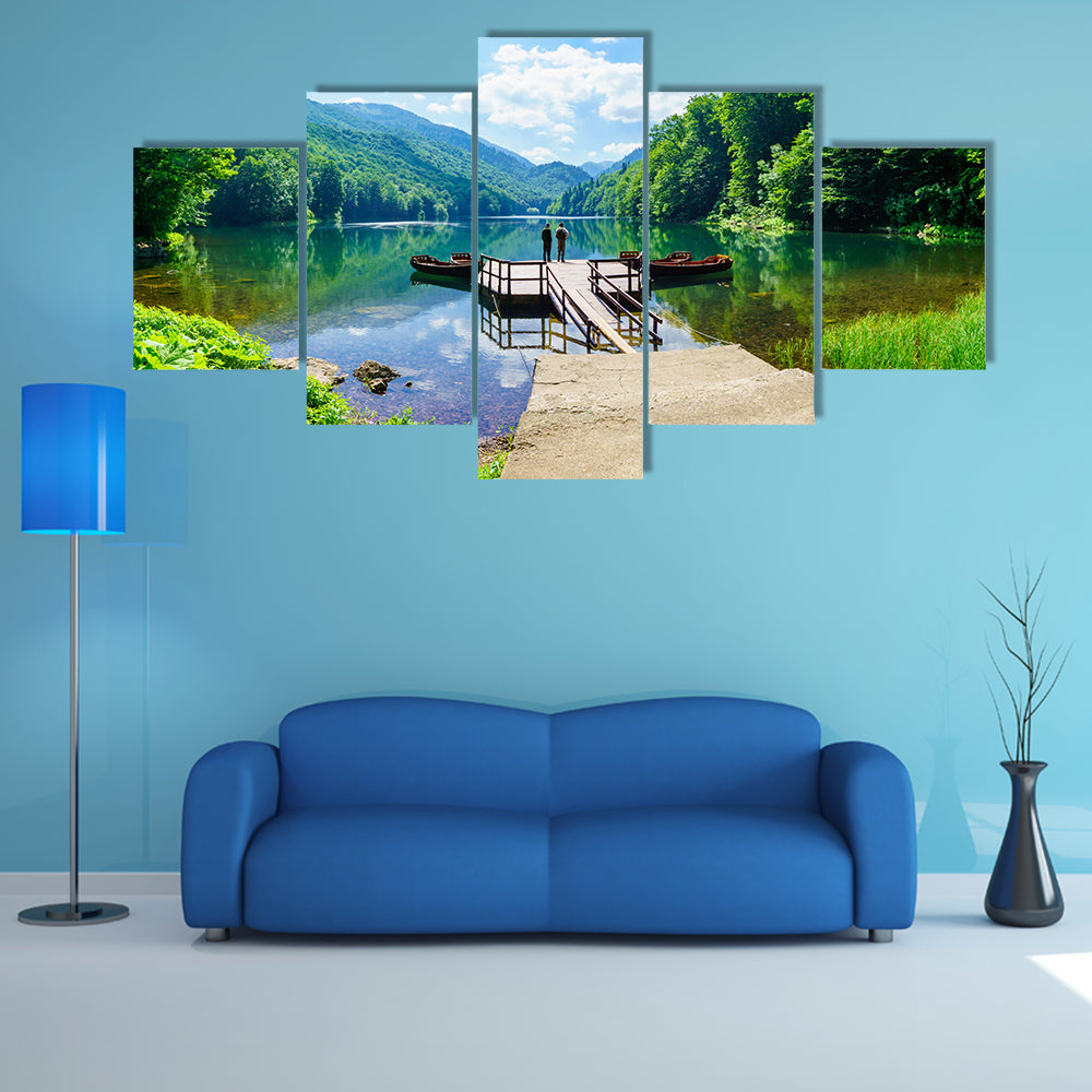 Fisherman on a pier in Lake Biograd Biogradsko jezero, Montenegro multi panel canvas wall art