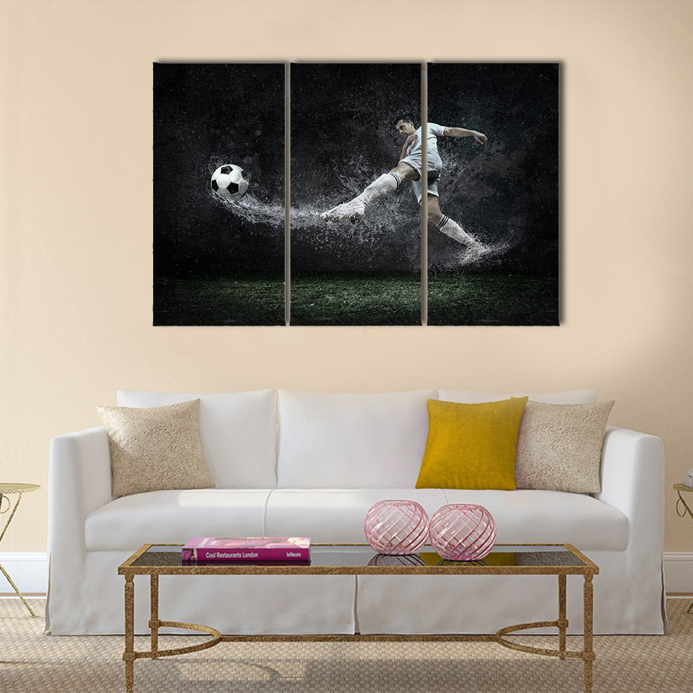 Splash of drops around football player under water Multi panel canvas wall art