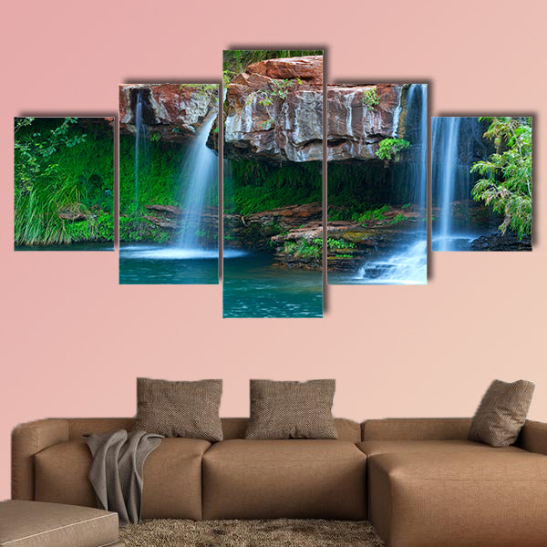 A small waterfall flowing into the Fern Pool in Western Australia multi panel canvas wall art