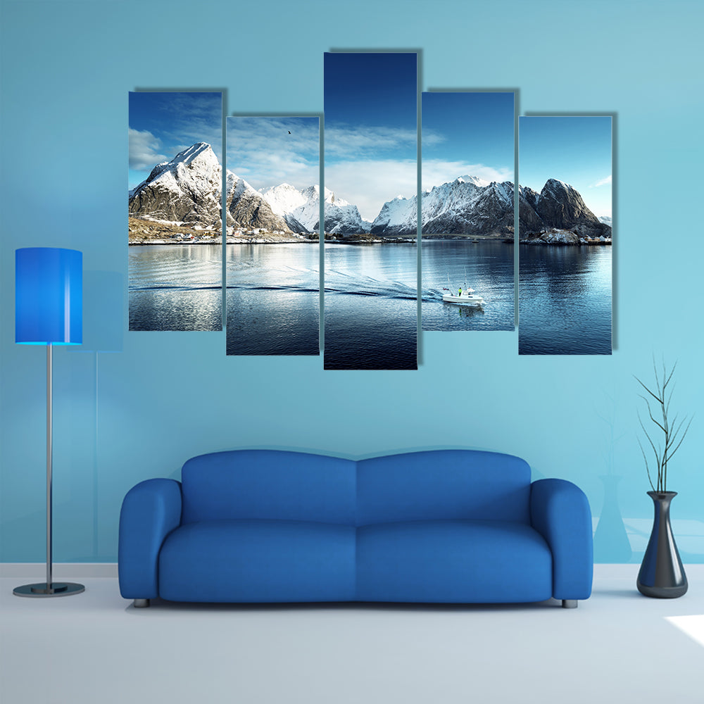 The snow in Reine Village, Lofoten Islands, Norway multi panel canvas wall art