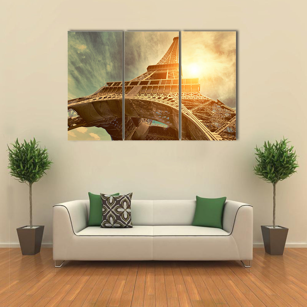 The Eiffel tower is one of the most recognizable landmarks in the world under sun light Multi panel canvas wall art