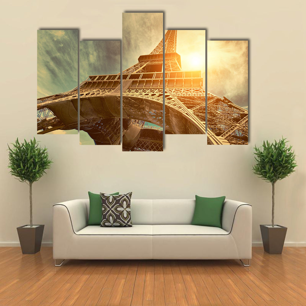 The Eiffel tower is one of the most recognizable landmarks in the world under sun light Multi panel canvas wall art