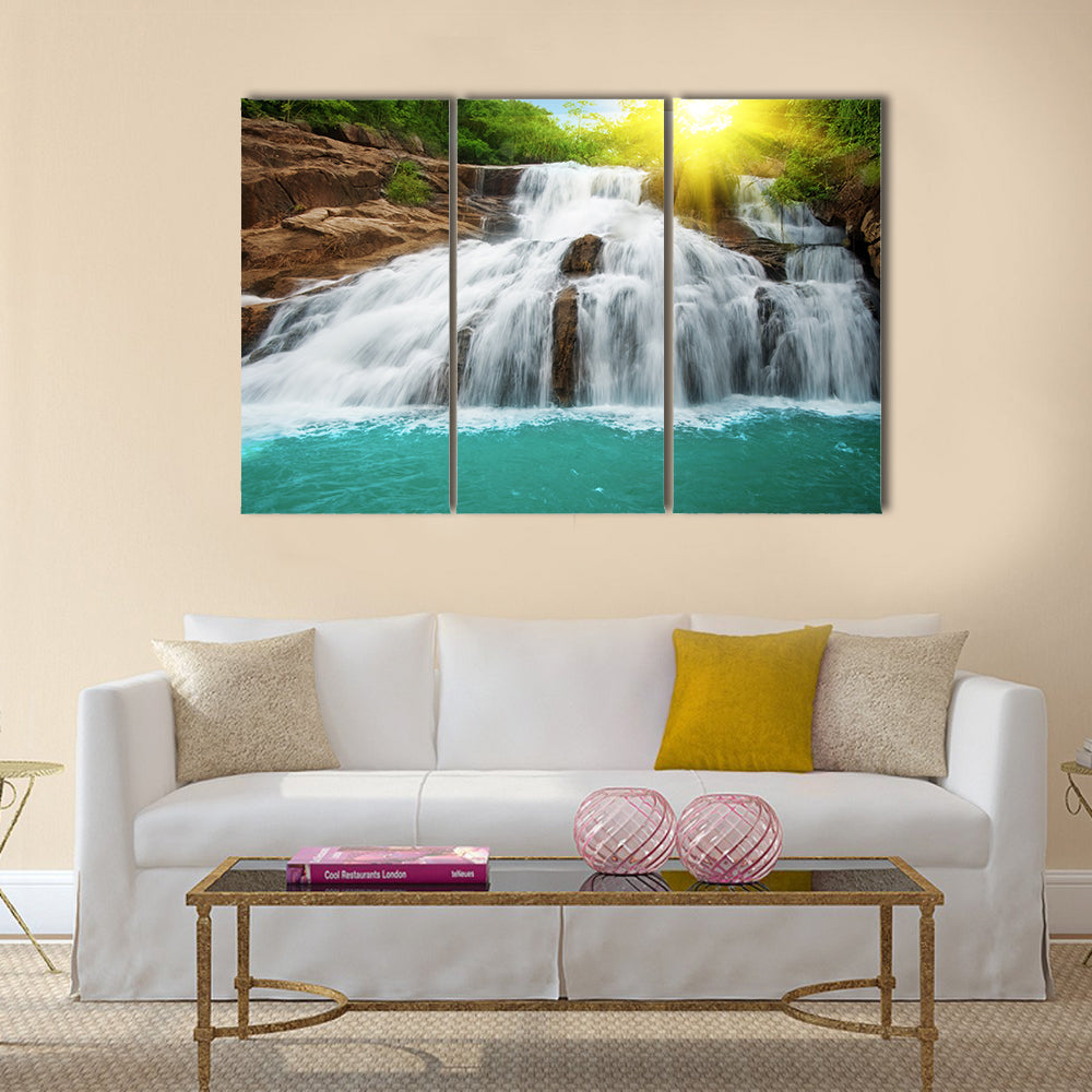 Waterfall pool in rain forest and sunlight Multi Panel Canvas Wall Art
