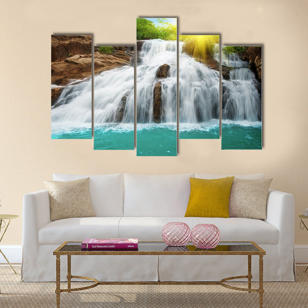 Waterfall pool in rain forest and sunlight Multi Panel Canvas Wall Art