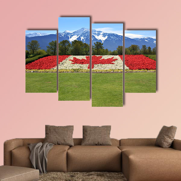 Canada flag done in red and white begonia flower against a backdrop wall art