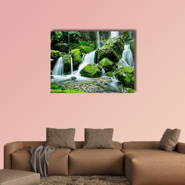 Beautiful waterfall with several cascades in the forest canvas wall art