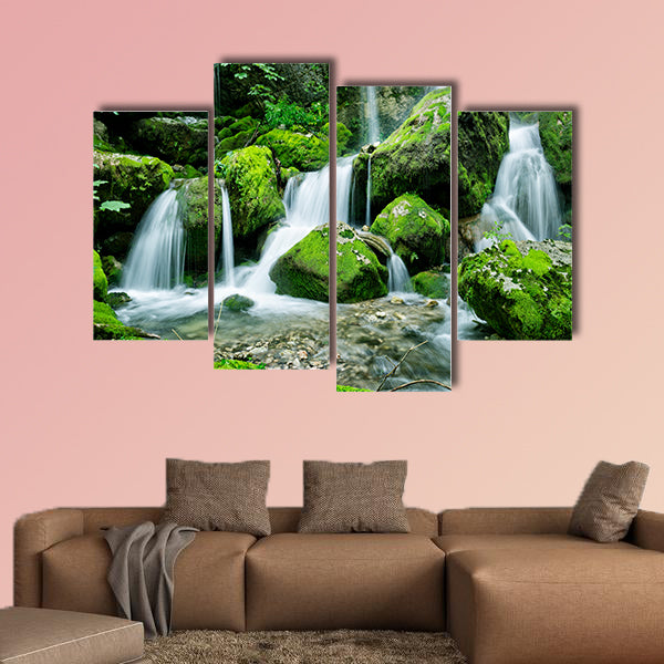 Beautiful waterfall with several cascades in the forest canvas wall art