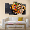 Mexican grilled chicken fajitas in iron skillet shot from overhead on slate Multi panel canvas wall art