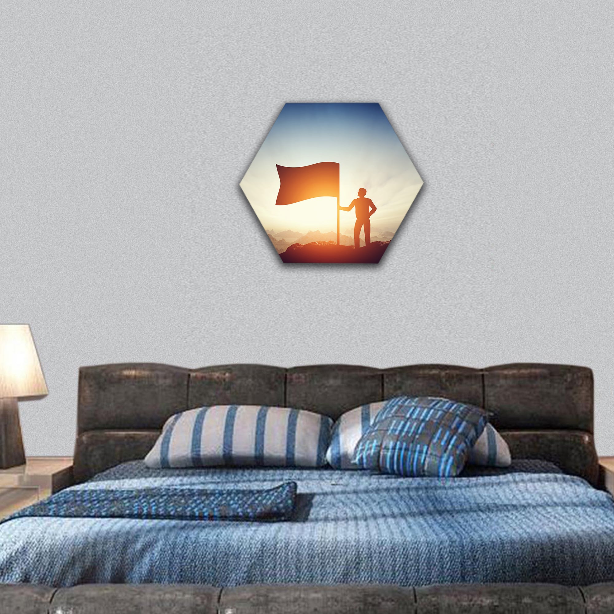Man raising a flag on the peak of the mountain hexagonal canvas wall art