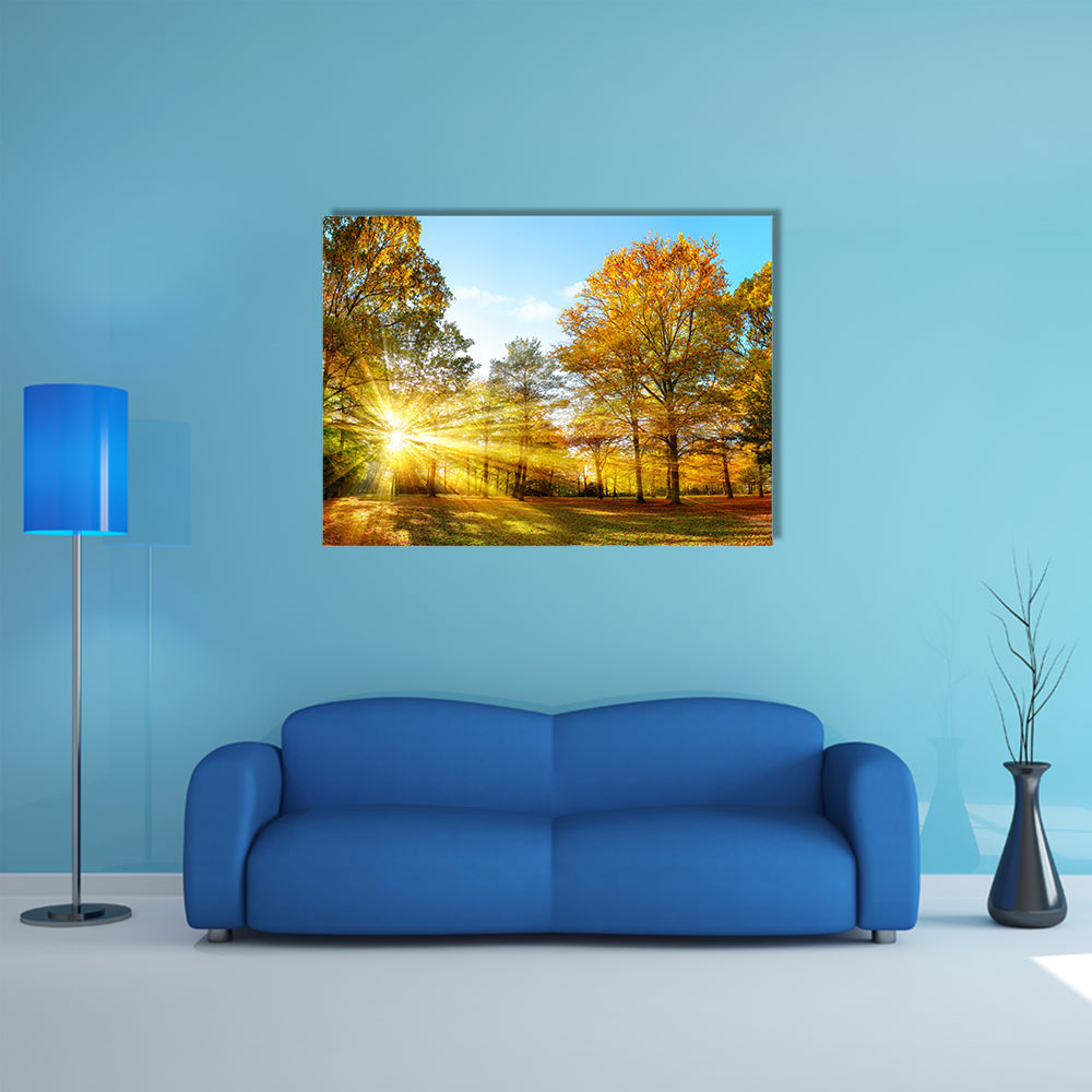 Scenic autumn panorama with the sun shining through the gold multi panel canvas wall art