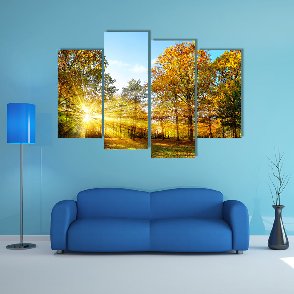 Scenic autumn panorama with the sun shining through the gold multi panel canvas wall art