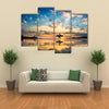 Sun Surfer A Man Is Walking With A Surf In His Hands Across The Sea Shore Multi Panel Canvas Wall Art