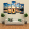 Sun Surfer A Man Is Walking With A Surf In His Hands Across The Sea Shore Multi Panel Canvas Wall Art