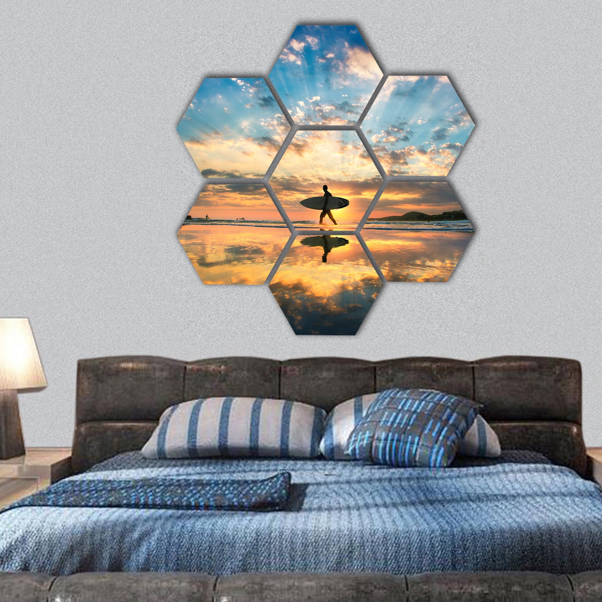 A man walking with surf in hands across sea shore hexagonal canvas wall art