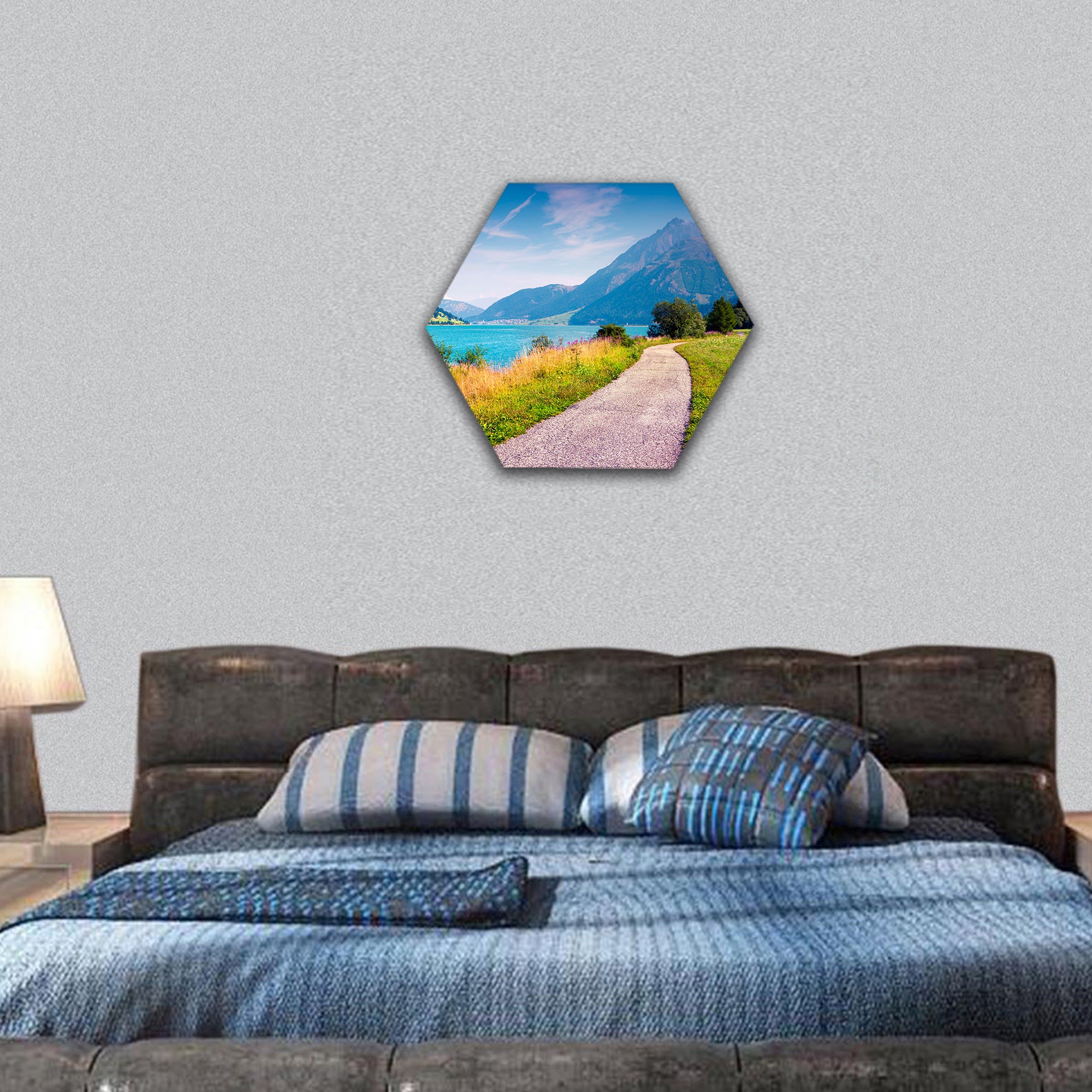 Bicycle path around Resia lake in the Italian Alps hexagonal canvas wall art