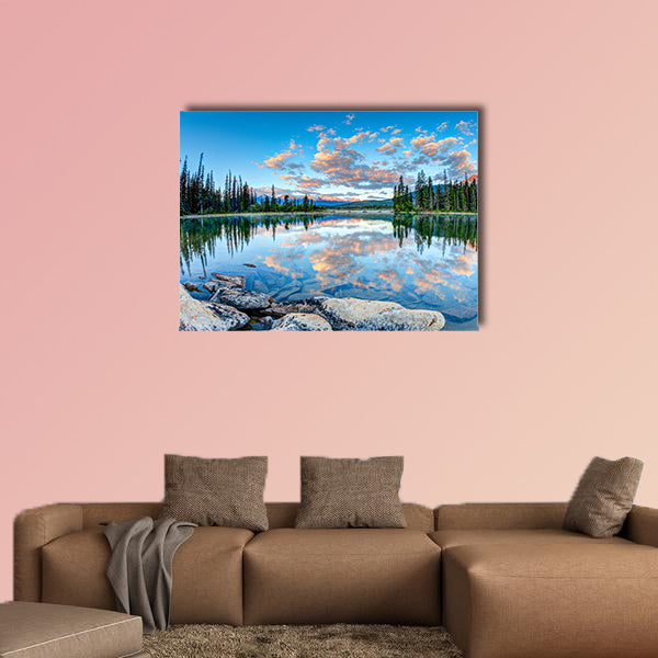 First glimpse of golden sunrise at Pyramid Lake in National Park, Canada wall art