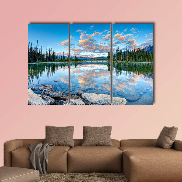 First glimpse of golden sunrise at Pyramid Lake in Jasper National Park wall art