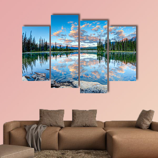 First glimpse of golden sunrise at Pyramid Lake in National Park, Canada wall art