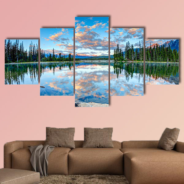 First glimpse of golden sunrise at Pyramid Lake in National Park, Canada wall art