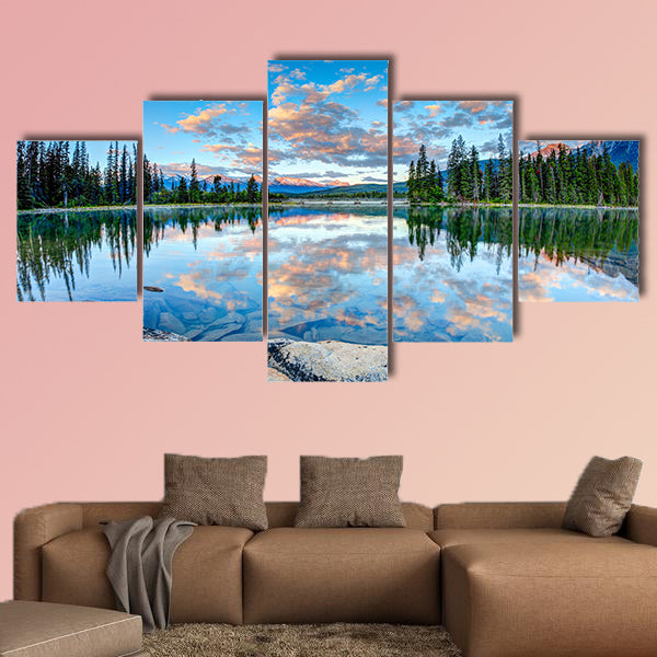 First glimpse of golden sunrise at Pyramid Lake in Jasper National Park wall art