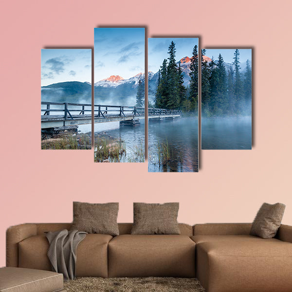 First glimpse of a golden sunrise on a misty and foggy morning multi panel canvas wall art