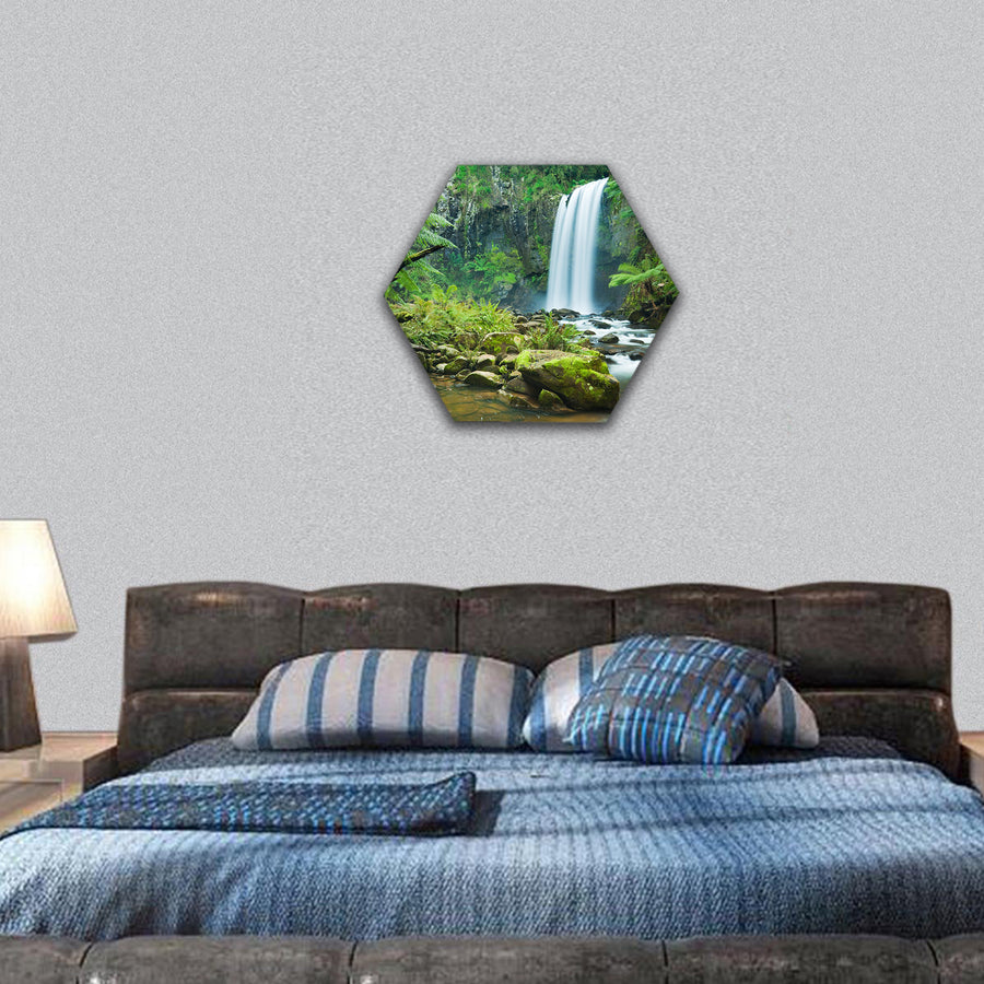 Waterfall in a lush rainforest, Australia hexagonal canvas wall art