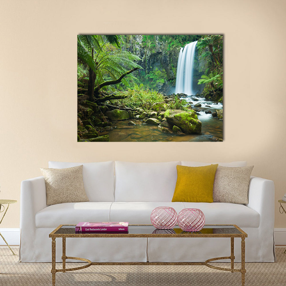 Waterfall in a lush rainforest Multi Panel Canvas Wall Art