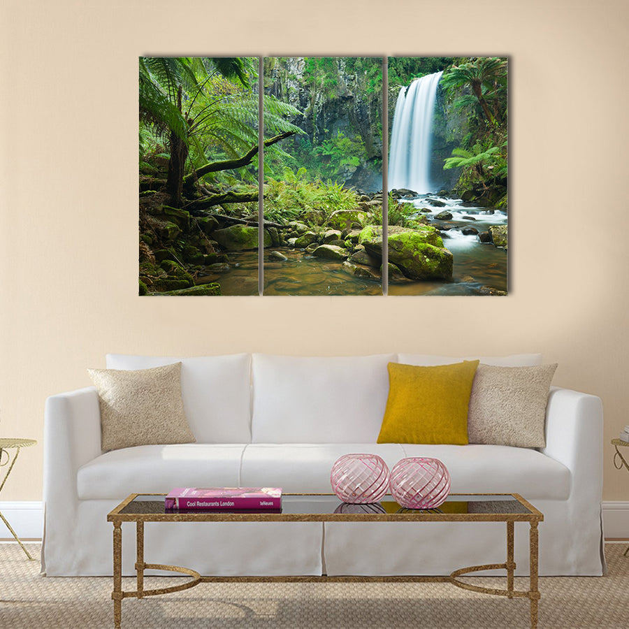 Waterfall in a lush rainforest Multi Panel Canvas Wall Art