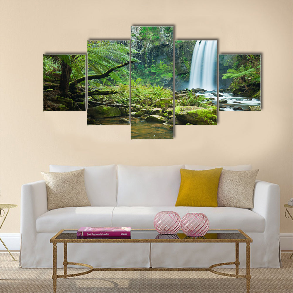 Waterfall in a lush rainforest Multi Panel Canvas Wall Art