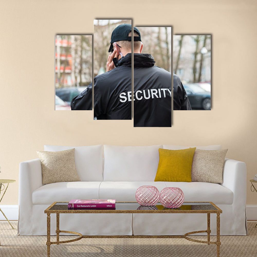 Security Guard In Black Uniform Multi panel canvas wall art