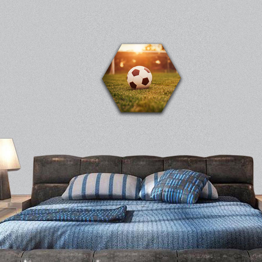 Soccer in the sunset hexagonal canvas wall art
