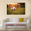 Soccer in the sunset Multi Panel Canvas Art