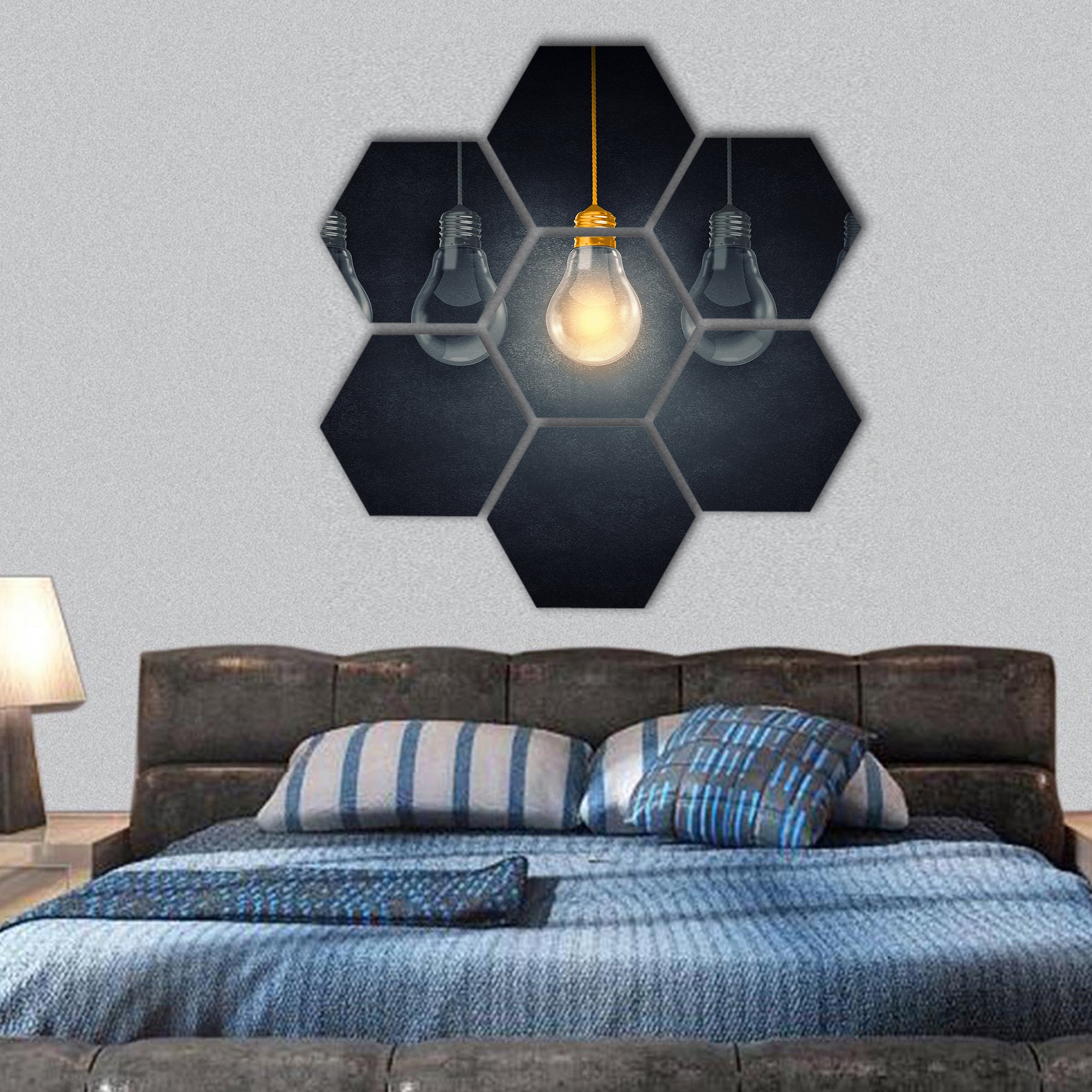 Light bulbs on dark background with one glowing hexagonal canvas wall art