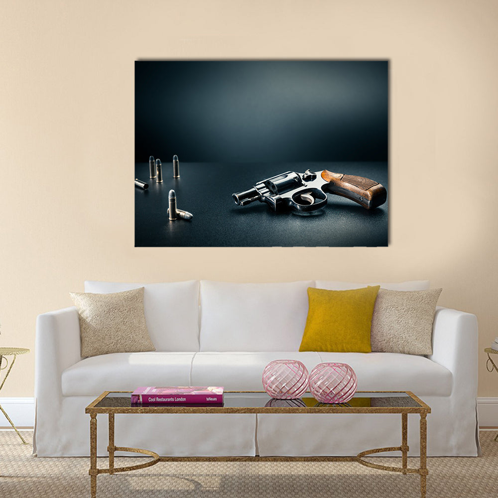 gun sitting on a table with bullet shells multi panel canvas wall art