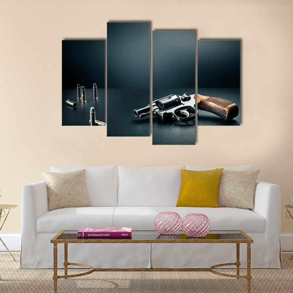 gun sitting on a table with bullet shells multi panel canvas wall art