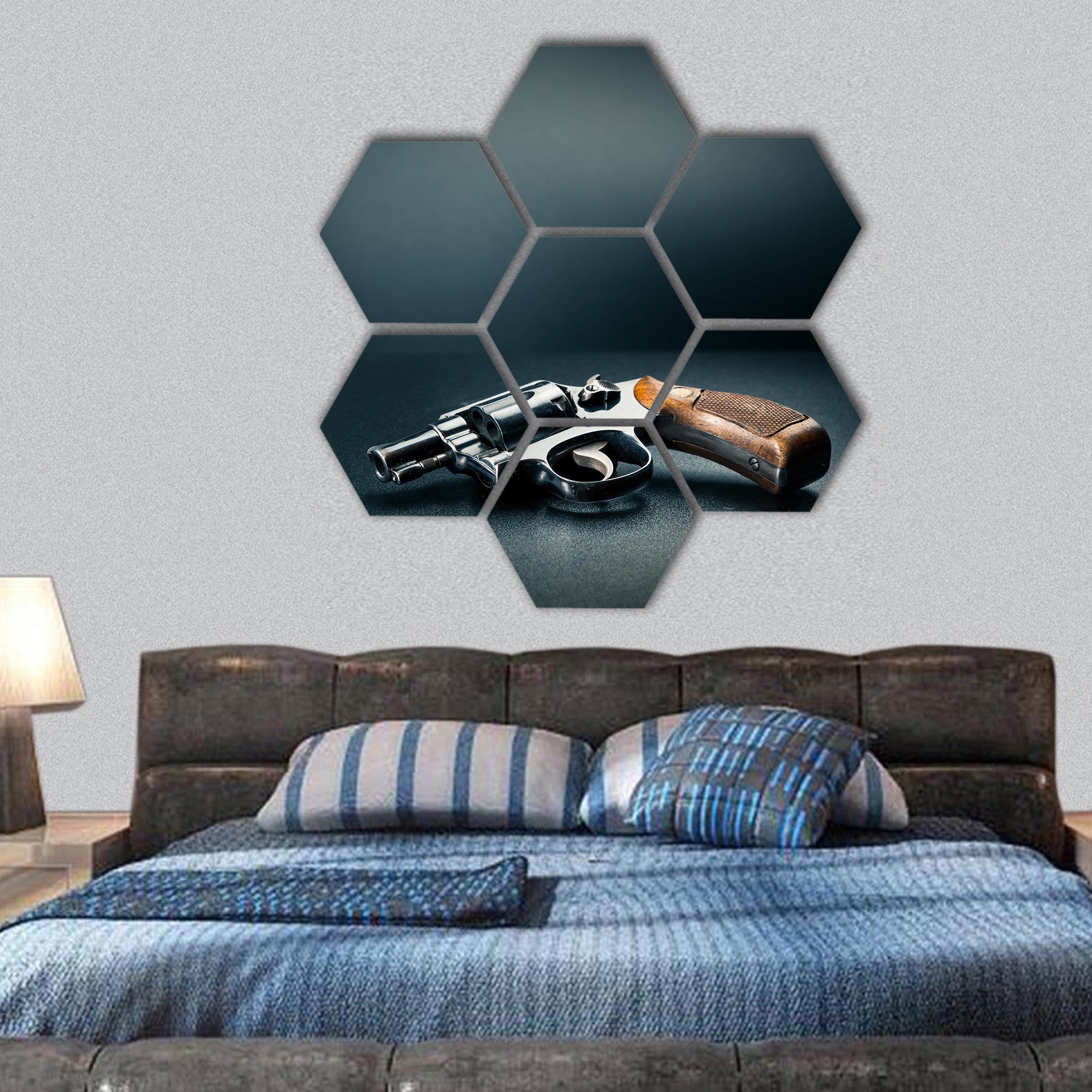 Gun sitting on a table with bullet shells hexagonal canvas wall art
