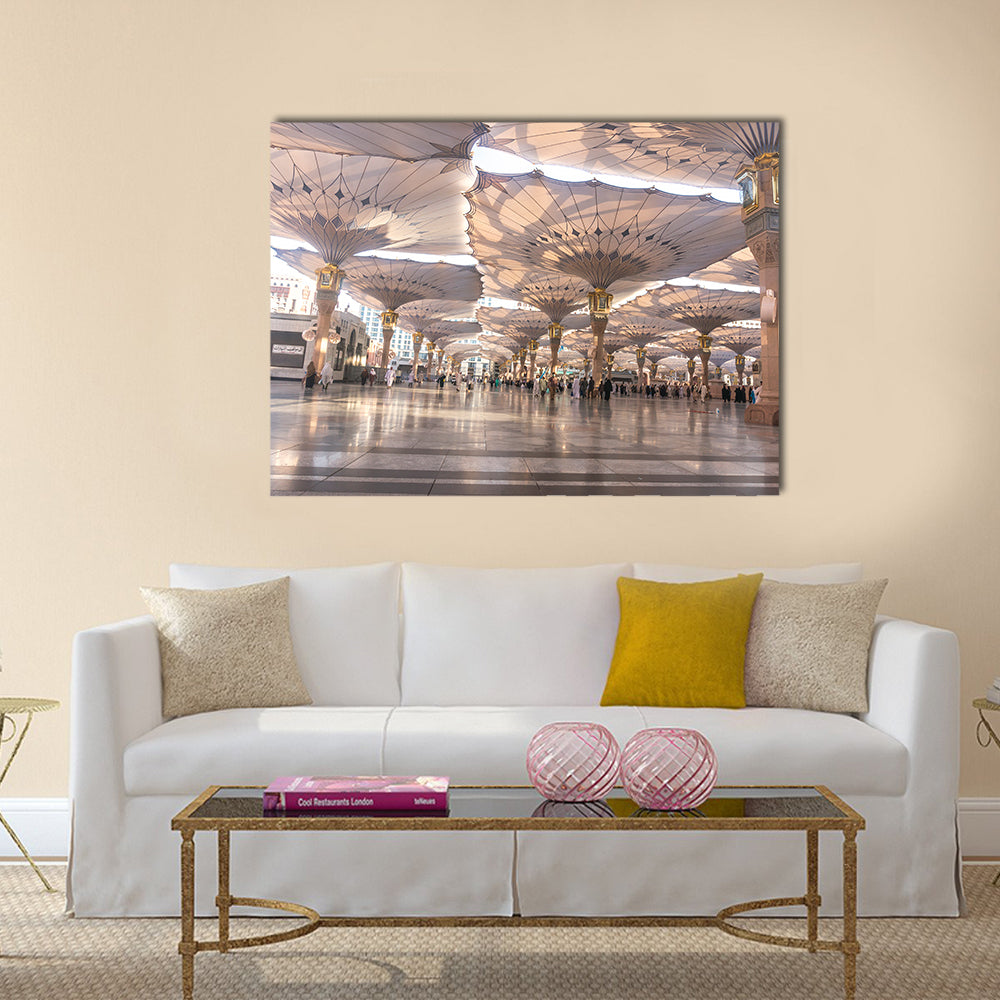 Pilgrims walk underneath giant umbrellas at Nabawi Mosque multi panel canvas wall art