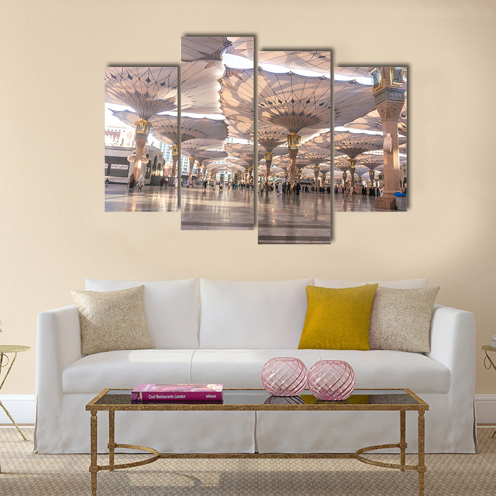 Pilgrims walk underneath giant umbrellas at Nabawi Mosque multi panel canvas wall art