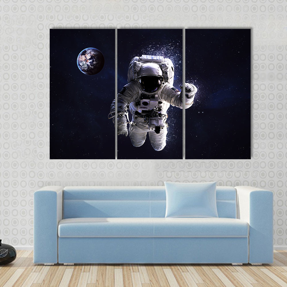 Astronaut In Water Multi Panel Canvas Wall Art