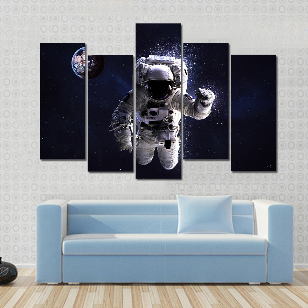Astronaut In Water Multi Panel Canvas Wall Art