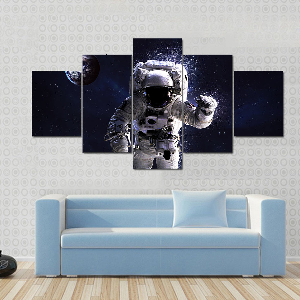 Astronaut In Water Multi Panel Canvas Wall Art