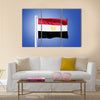 Flag of Egypt flying against a blue sky Multi panel canvas wall art