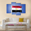 Flag of Egypt flying against a blue sky Multi panel canvas wall art