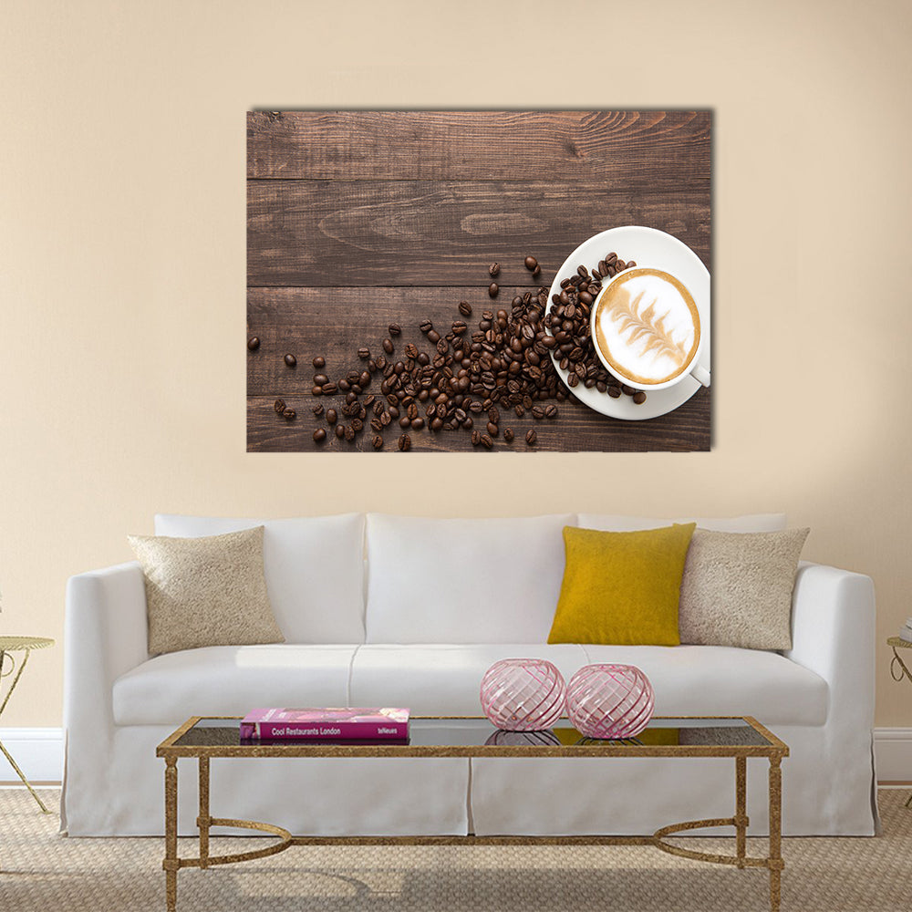 Coffee cup and coffee beans on wooden background Multi Panel Canvas Wall Art