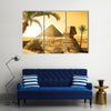 Palms near sphinx and Pyramid in Egyptian Desert Multi Panel Canvas Wall Art