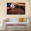 An old, antique American flag with vintage baseball equipment on a wooden bench Multi Panel Canvas Art