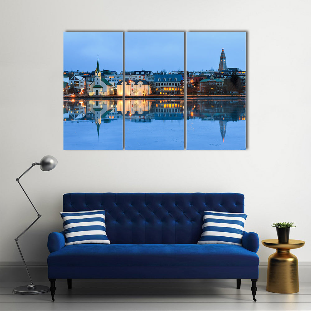 Beautiful reflection of the cityscape in Lake Multi Panel Canvas Wall Art