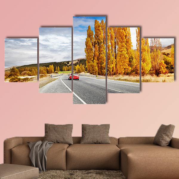 Autumn landscape with road and red car, New Zealand Multi panel canvas wall art