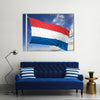 Waving flag of Netherlands on flagpole Multi panel canvas wall art